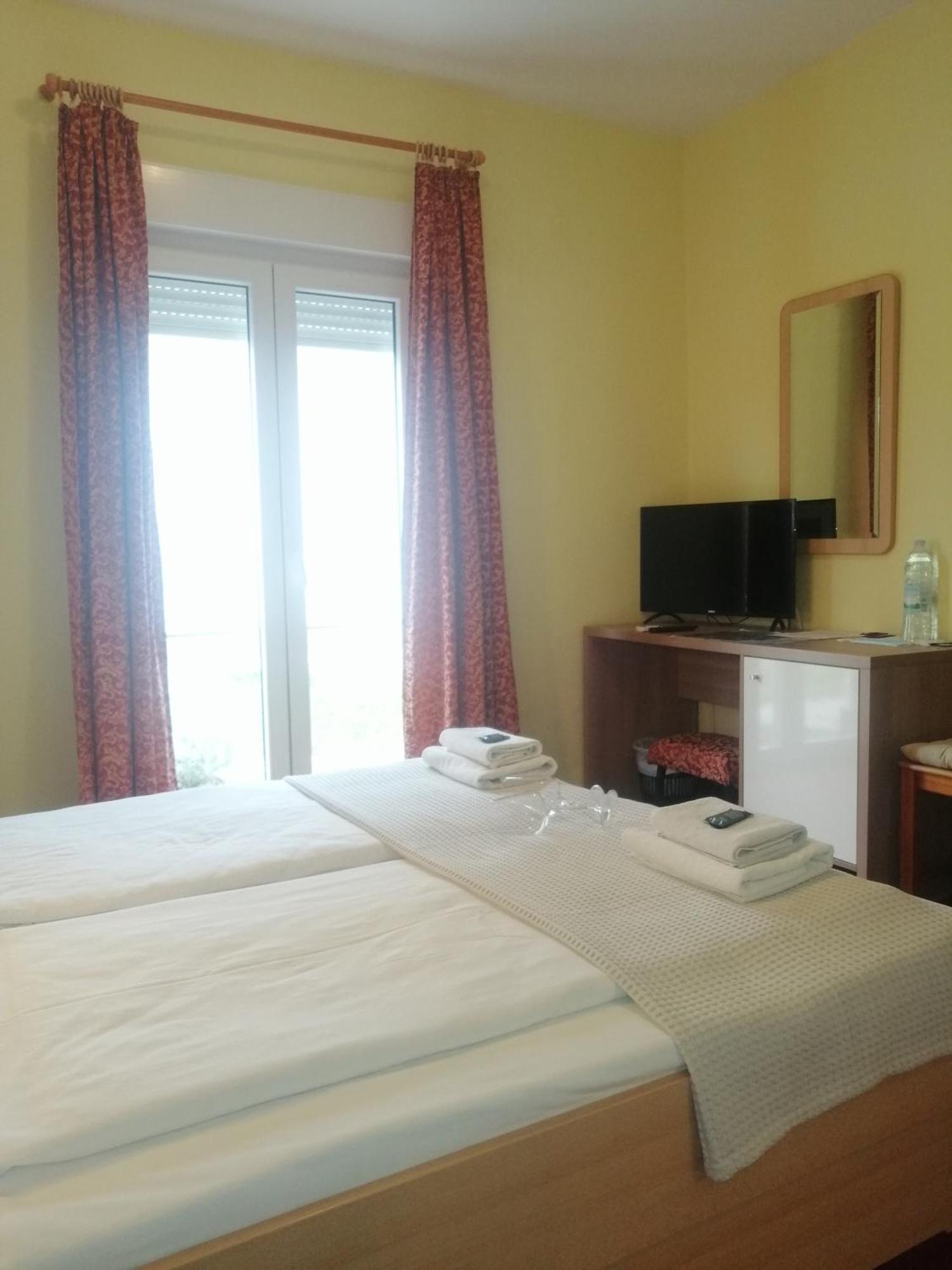 Apartmani Simon Lopar Rom bilde